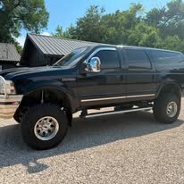 Lifted Ford Excursion after a full detail