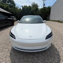 Vehicle with business graphics after washing