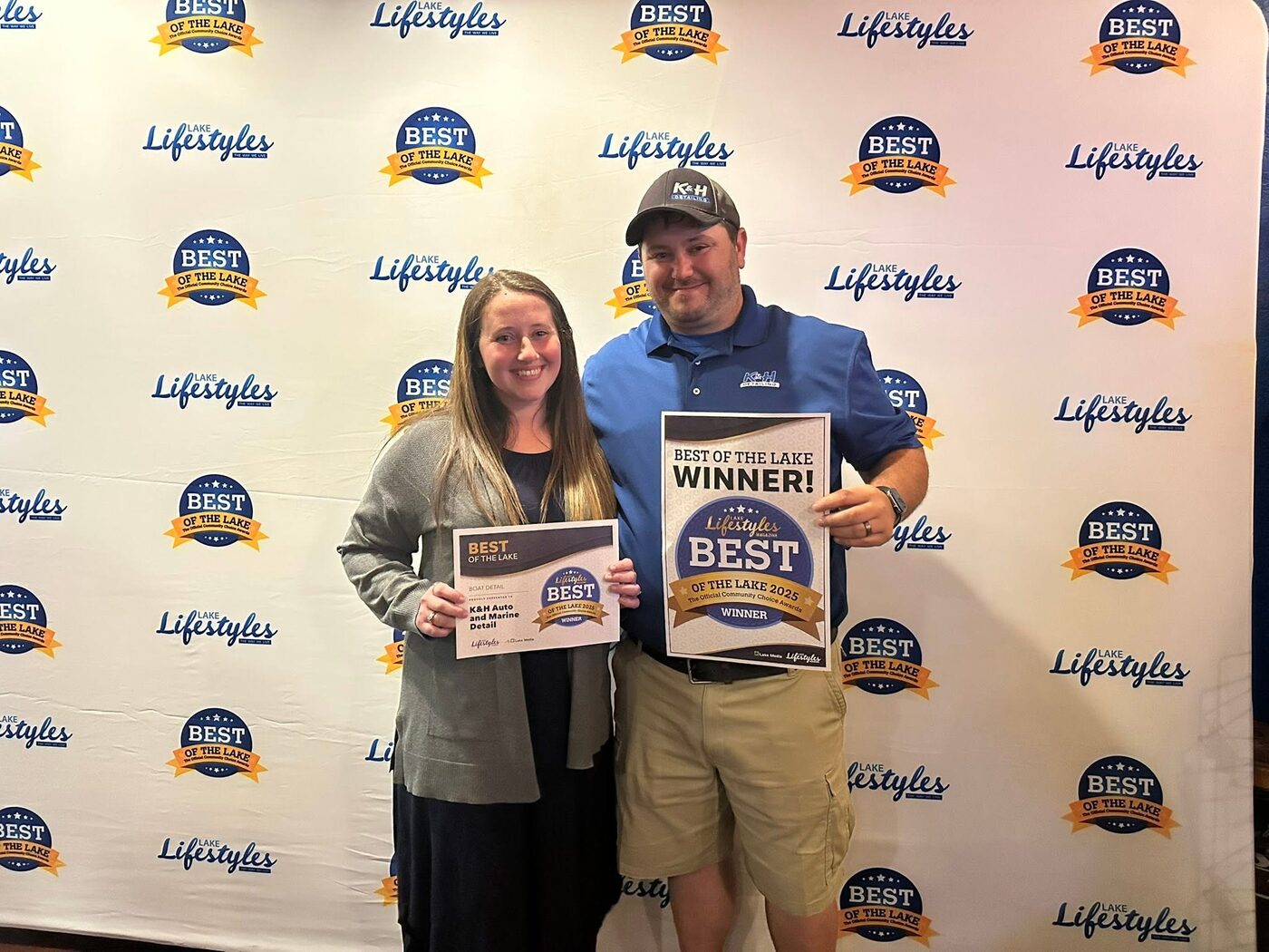 The owners of K & H accepting their Best of the Lake 2025 award for Boat Detail